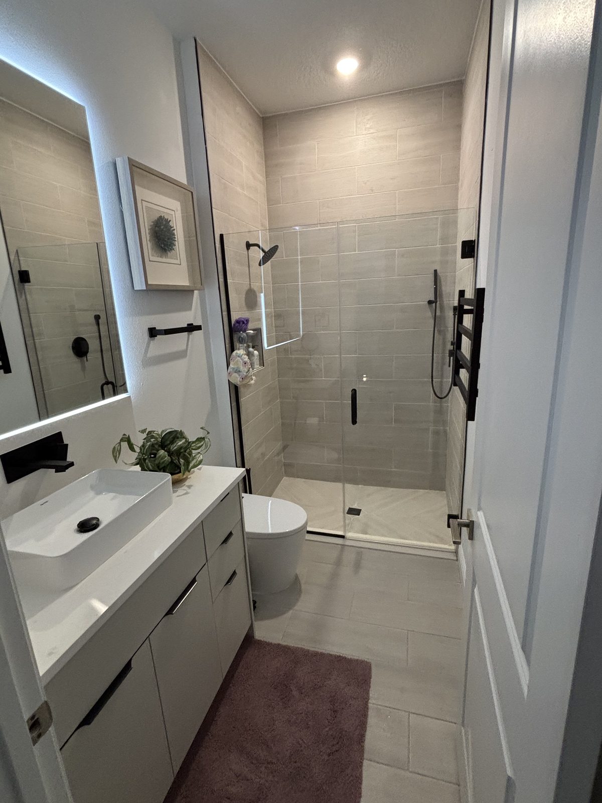 Modern Bath with Backlit Mirror